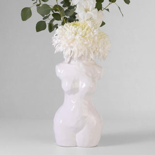 Modern glossy white body-shaped vase for flowers